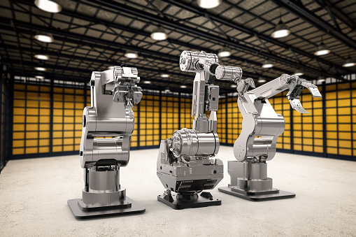 3d rendering three robotic arms in a row